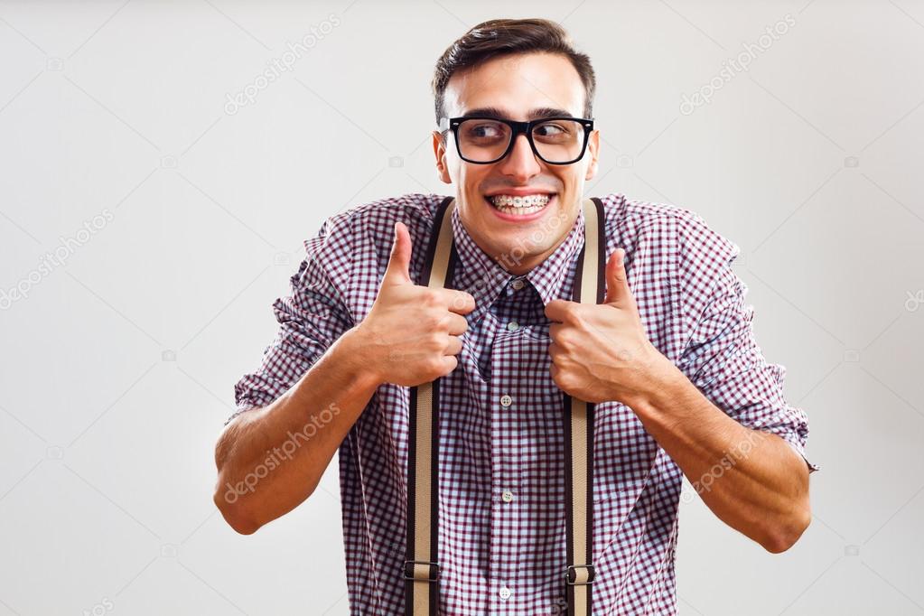 Nerdy man showing thumbs up