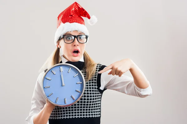 Erdy woman  holding watch — Stock Photo, Image