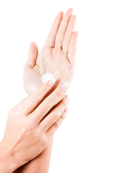 Female hands applying moisturizer — Stock Photo, Image