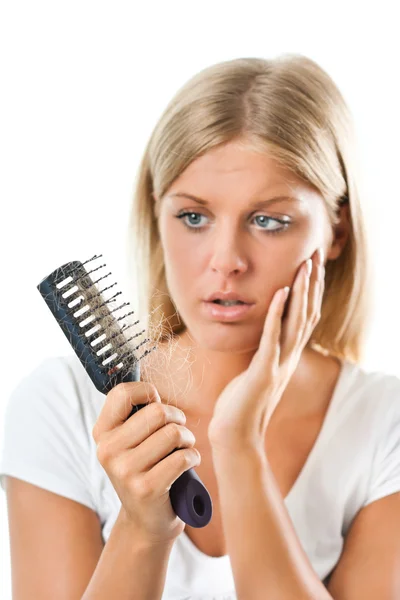 Blonde girl worried about hair loss — Stock Photo, Image