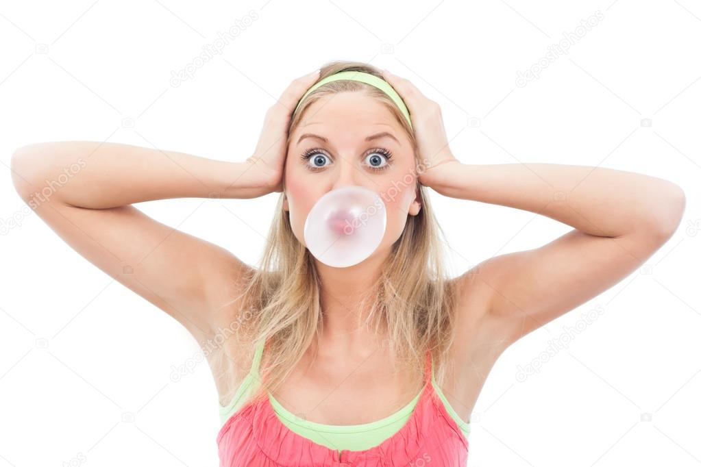 Girl blowing big bubble gum