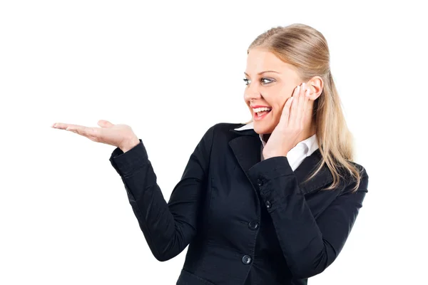 Woman showing or holding your product — Stock Photo, Image