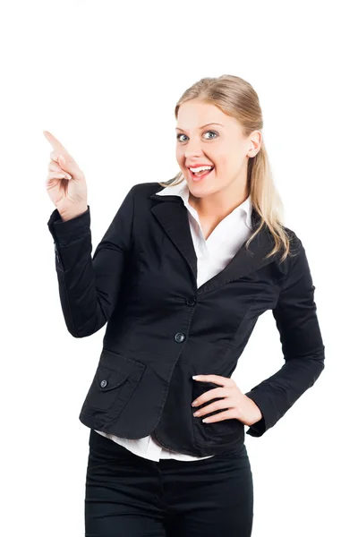 Mujer de negocios alegre apuntando a su producto —  Fotos de Stock