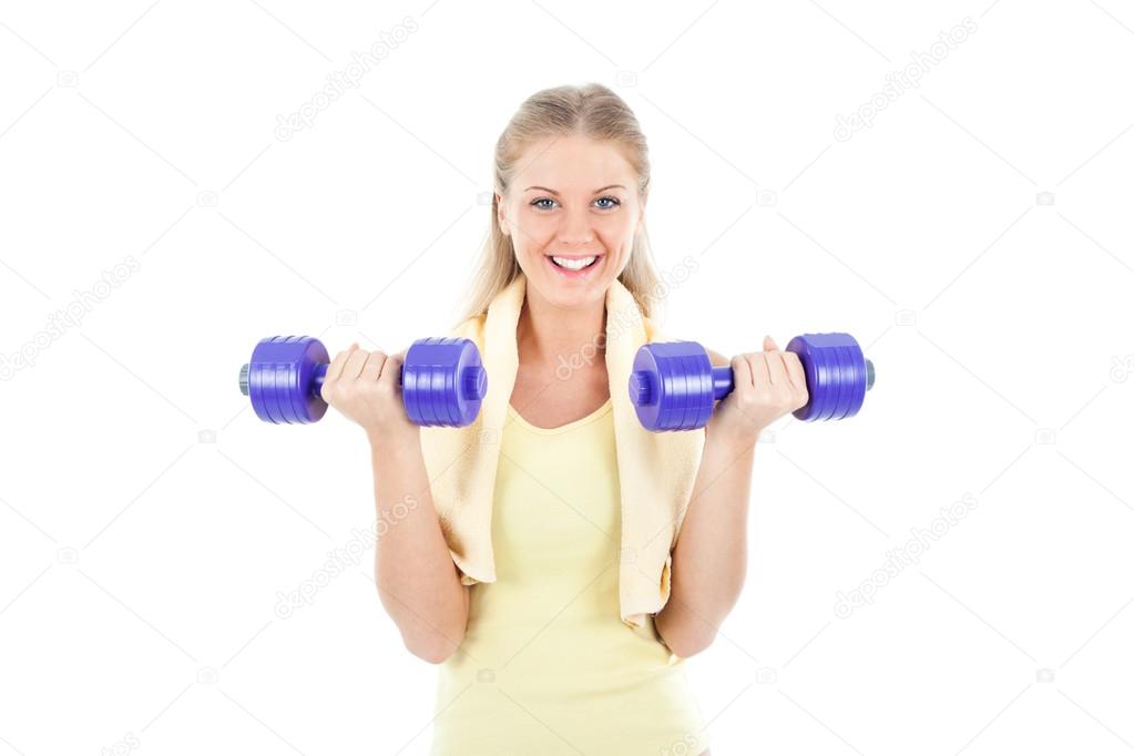 Beautiful young woman with dumbbell