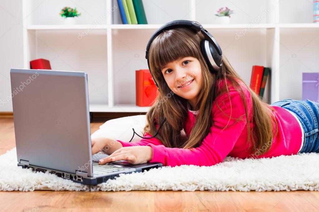Little girl using laptop
