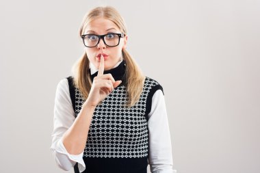 Nerdy woman knows a secret and she will not say it clipart