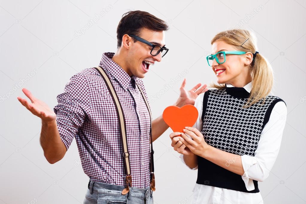 woman give heart to boyfriend