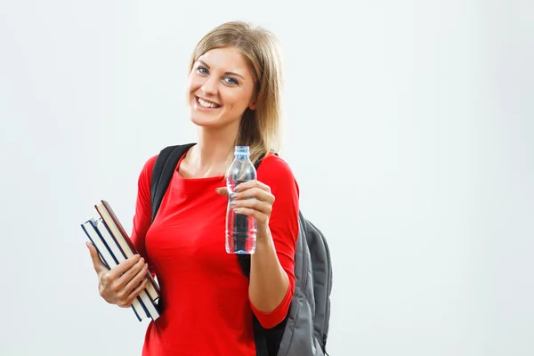 Student girl holding water — Stock Photo, Image