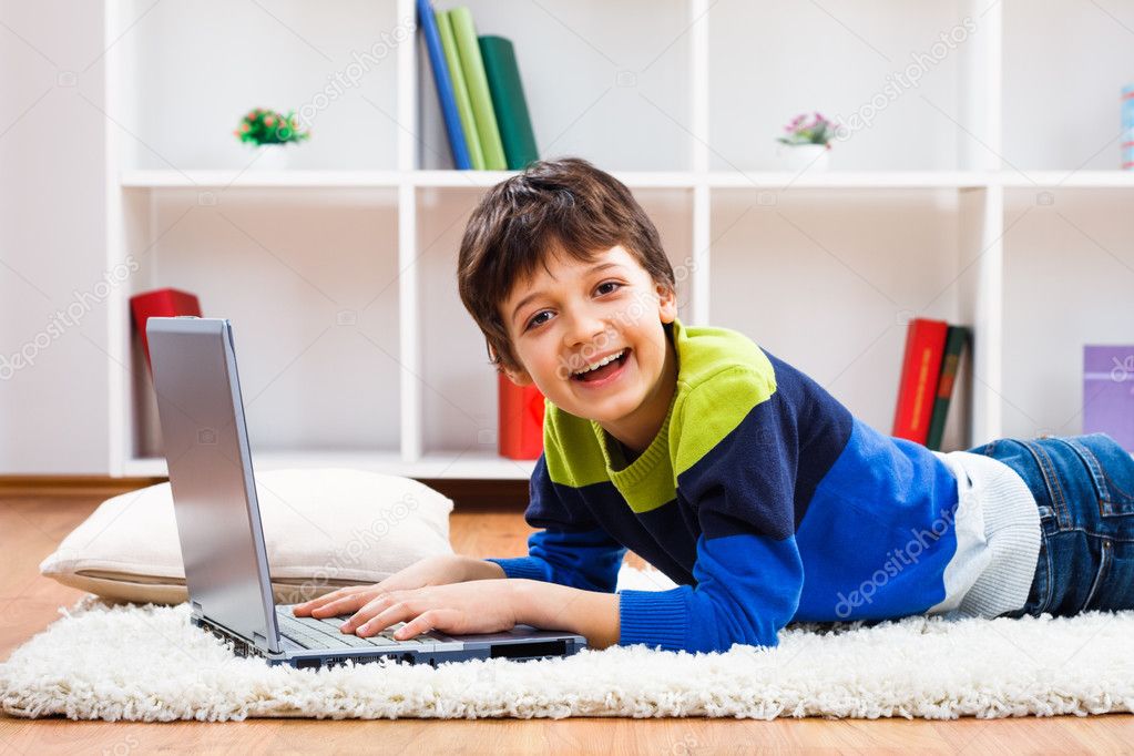 young boy with laptop