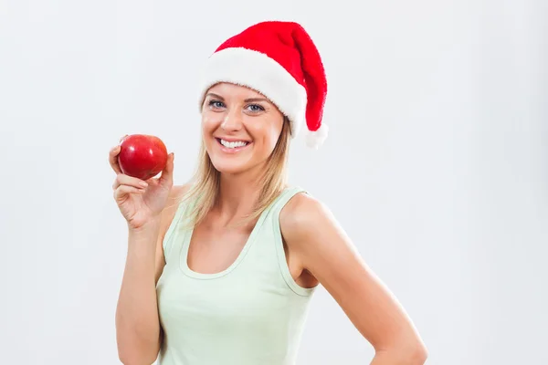 Santa vrouw met apple — Stockfoto