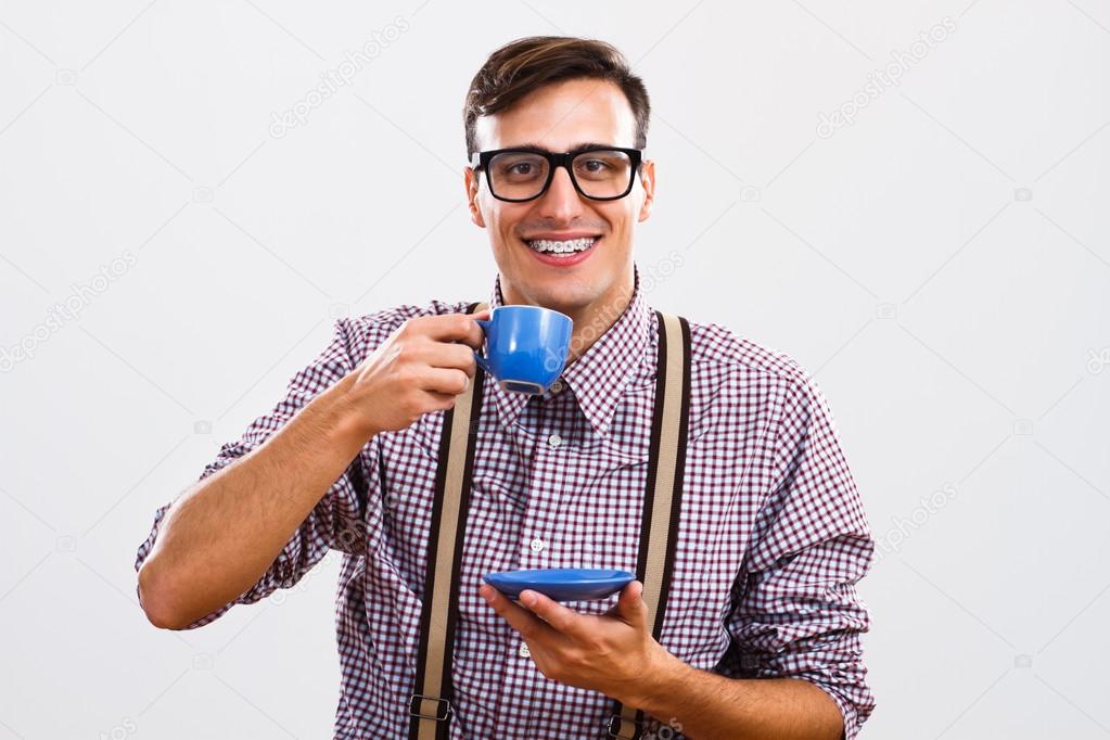 nerd man drinking tea