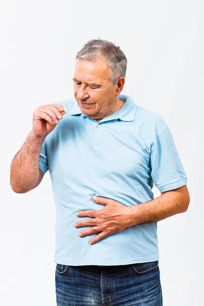 Senior hat Bauchschmerzen — Stockfoto