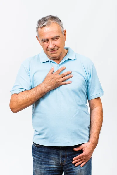 Heart attack symptoms at senior man — Stock Photo, Image