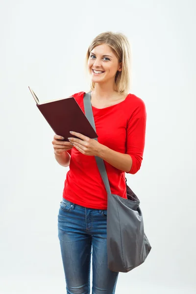 Student tjej läsa bok — Stockfoto