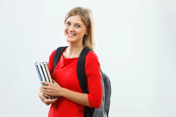 Šťastný student s knihami — Stock fotografie