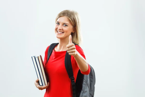 Estudiante chica sosteniendo libros — Foto de Stock