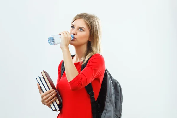 Estudiante chica con libros y agua — Foto de Stock