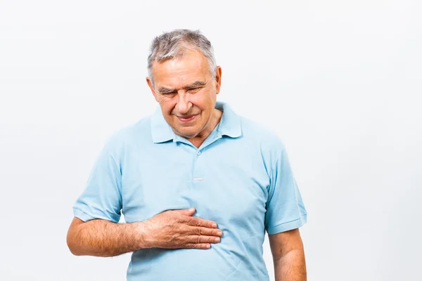 Senior man having stomach pain — Stock Photo, Image