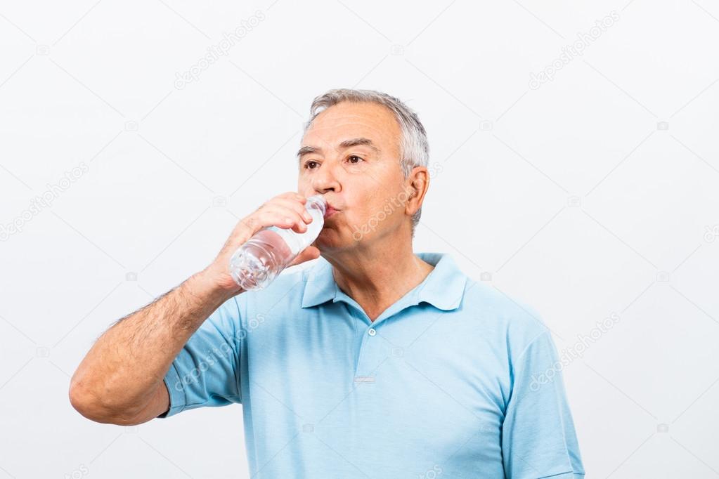 senior man drinking water