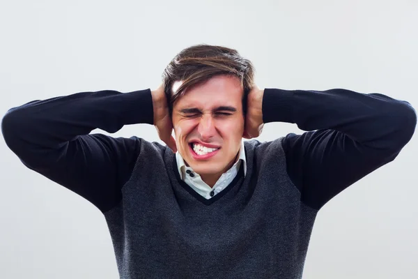 Stressed young businessman — Stock Photo, Image