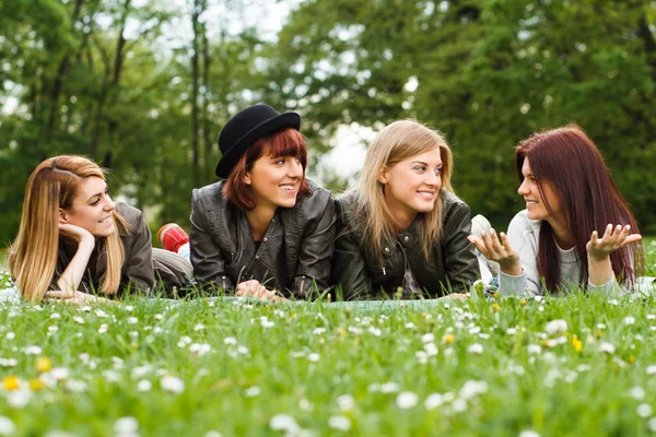 Girls resting in park Royalty Free Stock Photos