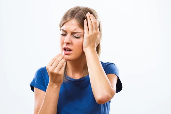 Young woman is having headache — Stock Photo, Image