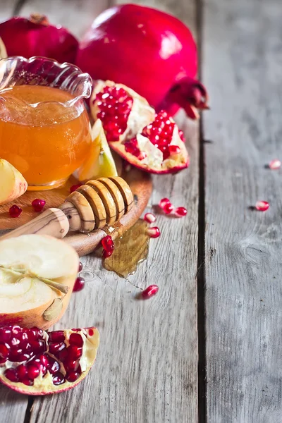Gránátalma-, alma- és méz háttér — Stock Fotó