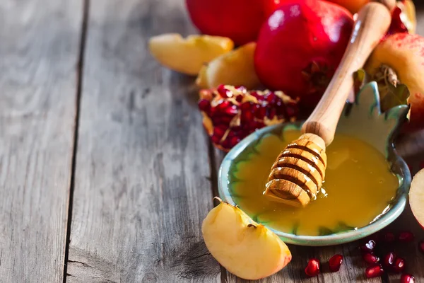 Granatäpple, äpplen och honung bakgrund — Stockfoto