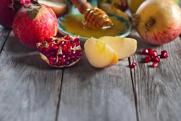石榴、 苹果和蜂蜜的背景 — 图库照片