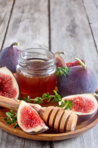 Figs and honey — Stock Photo, Image