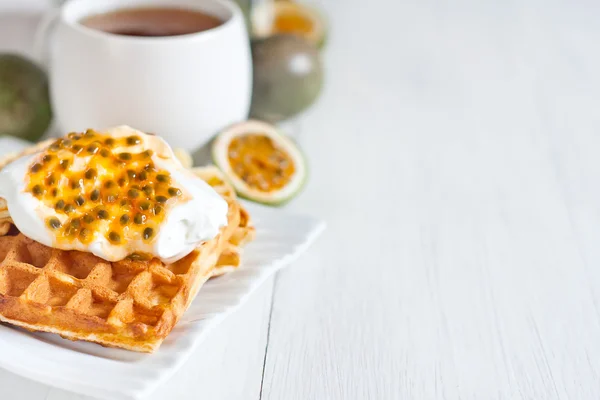 Waffles with cream and passionfruit background — Stock Photo, Image