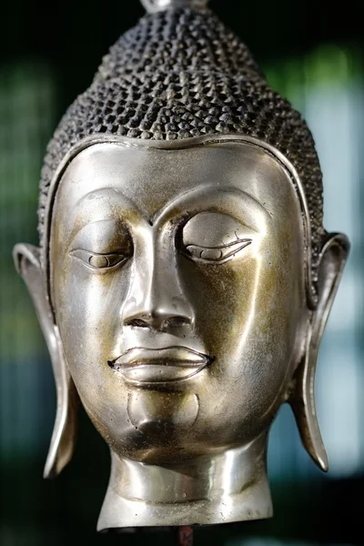 Bronze buddha head. close-up — Stock Photo, Image