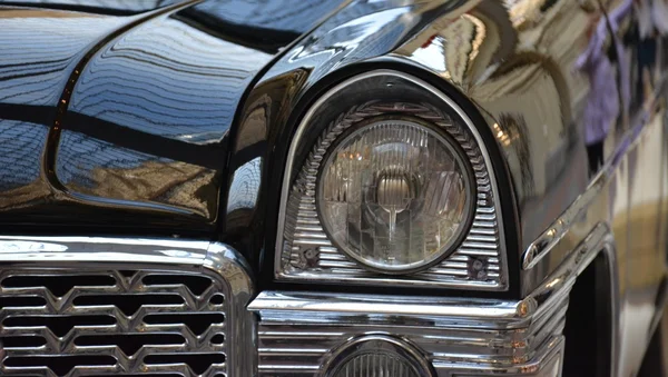 Headlight of black car — Stock Photo, Image