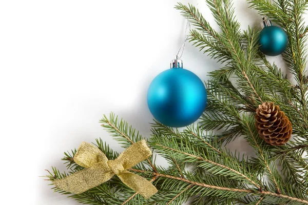 Spruce branches with Christmas decorations. — Stock Photo, Image