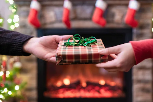 Man Giving Christmas New Year Gift Box Woman Front Christmas — Fotografia de Stock