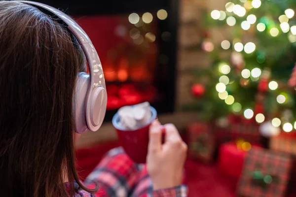 Woman Pajama Headphones Cup Hot Cocoa Marshmallow Sitting Warming Winter — Stock Photo, Image