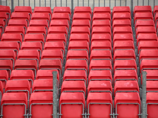 Concert Platform Closeup with Rows of Red Plastic Seats — Stock Photo, Image