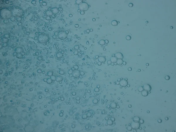 Modré bazénové vody s vzorek pozadí bublina — Stock fotografie