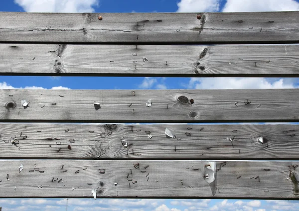 Dashboard of worn planks with rusty staples — Stock Photo, Image