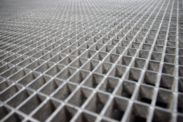 Perspectiva de la rejilla de acero galvanizado gris Imagen de stock