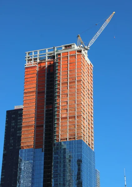 Skyscraper Building Site Half Completed with Top Crane — Stock Photo, Image