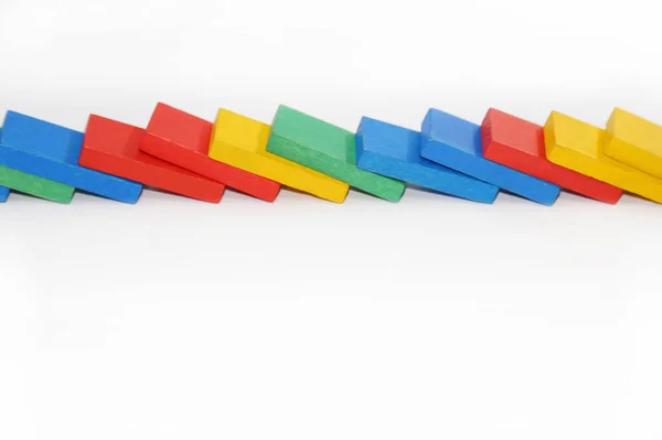 Wooden Colorful Toys Lie Nearby Dominoes Multi Colored Shapes Chain Stock Picture