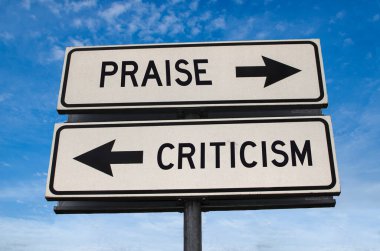 Praise vs criticism. White two street signs with arrow on metal pole with word. Directional road. Crossroads Road Sign, Two Arrow. Blue sky background. Two way road sign with text. clipart
