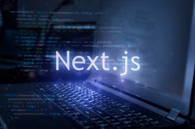 Next.js dizüstü bilgisayara ve kod arka planına karşı yazıtlar.