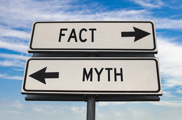 Fact Myth Road Sign Two Arrows Blue Sky Background White — Stock Photo, Image