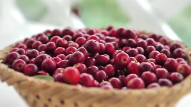 Lingonberry are hitting the wicker bowl in super slow motion Video Clip