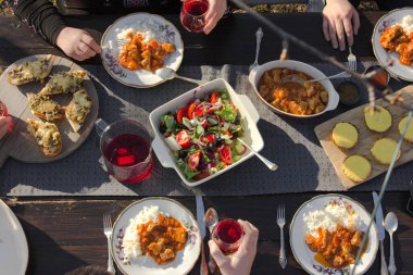 top view of family eating at table at daytime