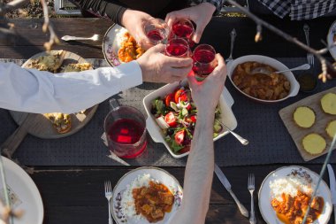 top view of family eating at table at daytime