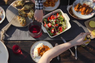 top view of family eating at table at daytime