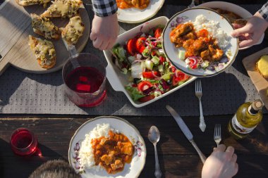 top view of family eating at table at daytime